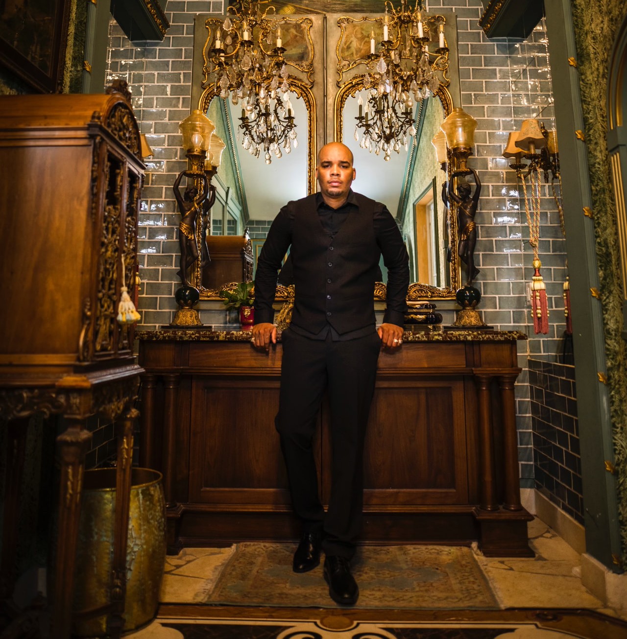 The DJ behind Lite Worx Entertainment in an elegant mansion venue